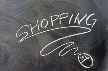 Shopping word and computer mouse drawn on chalkboardの写真素材