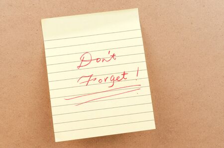 Don't forget words written on a sticky noteの写真素材