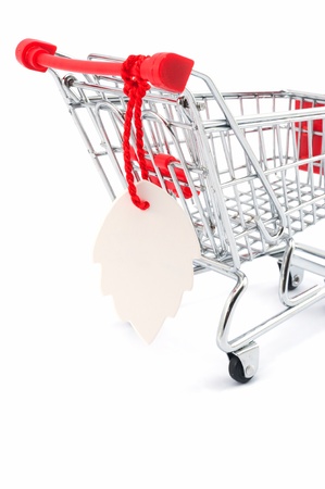 Blank tag hung on a shopping cartの写真素材