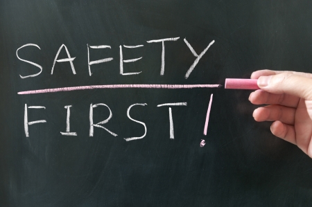 Safety first words written on blackboardの写真素材