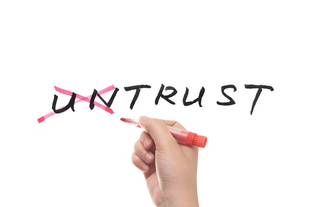 Untrust to trust concept, hand writing on white boardの写真素材