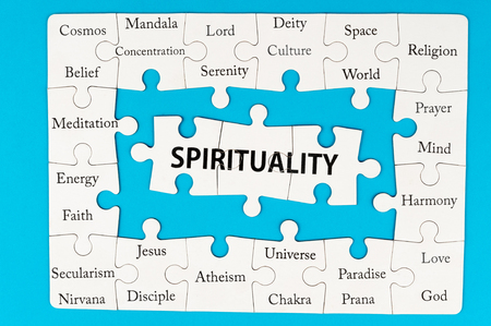 Spirituality concept words on group of jigsaw puzzle piecesの写真素材