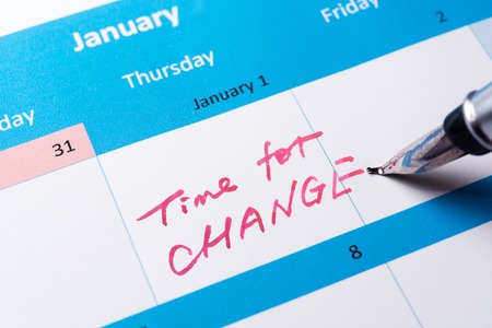 Time for change written on the calendar with a penの写真素材