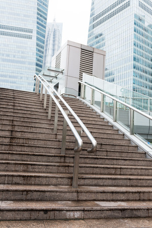 Stairs leading to the footbridge in Shanghai city of Chinaの写真素材