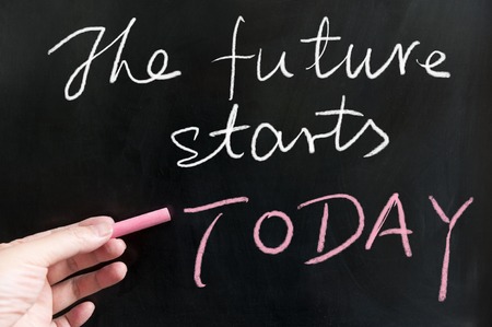The future starts today words written on blackboard using chalkの写真素材