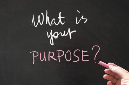 What is your purpose words written on blackboard using chalkの写真素材