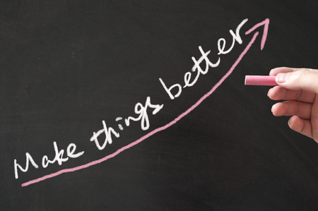 Make things better concept words written on the blackboard using chalkの写真素材