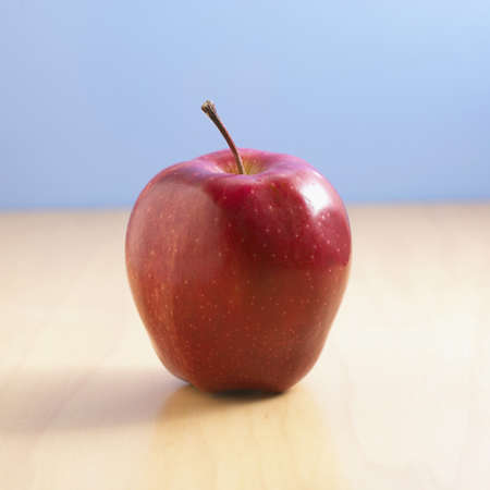 Single Red Appleの写真素材