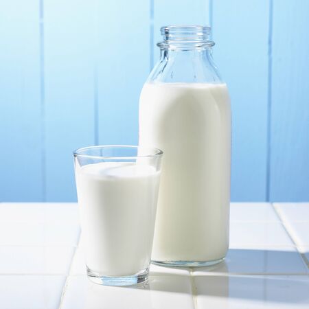 Glass and Bottle of Milkの写真素材