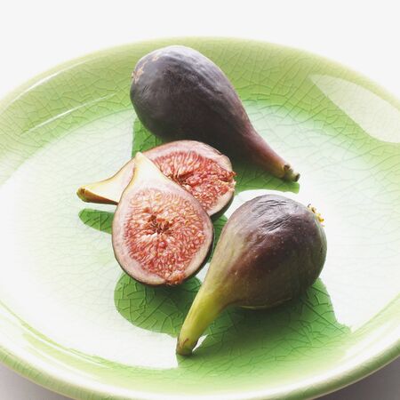 Halved and Whole Figsの写真素材