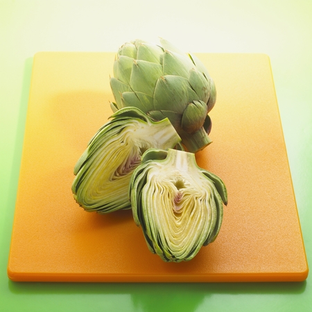 Cut and Whole Artichokesの写真素材