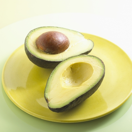 Halved Avocadoの写真素材
