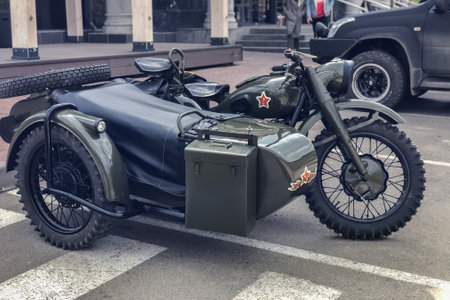 Russian retro motorcycle URAL khaki. Moto during the second world war with Soviet symbols.のeditorial素材