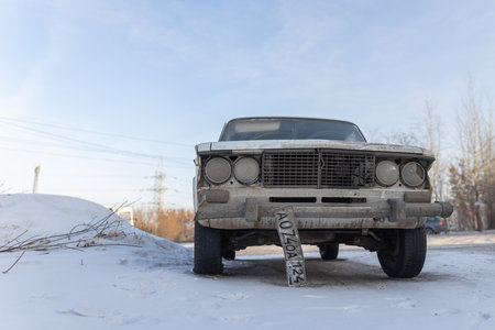 Krasnoyarsk, Russia, August 10, 2019: Russian retro Lada 2106 car on the street abandoned or stolen.のeditorial素材