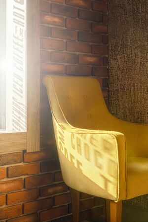 shade the word shoco from the lettering on the window on the light green chair by the window in the...