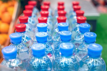 Rows of water bottles, clean drinking water, beautiful backgroundの写真素材