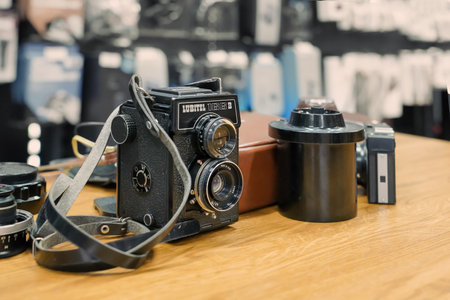 Krasnoyarsk, Russia, 1 december 2019: Old Soviet vintage medium format camera Lubitel 166, and the reservoir for the manifestation of film and old lensesのeditorial素材