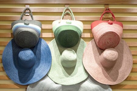 Various broad brimmed women's straw hats, trendy. Summer vacation fashion accessories beach party...
