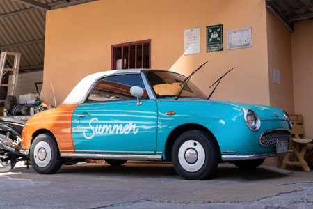Patong, Phuket Thailand, January 5, 2020: funny little car with the inscription summer, standing in the Parking lot and waiting for tourists in the hotelのeditorial素材
