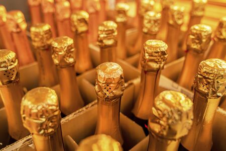 wine Golden bottle necks, close-up of a box of champagneの写真素材