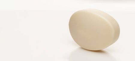 soap on a white background. close-up, beige color, copy spaceの写真素材