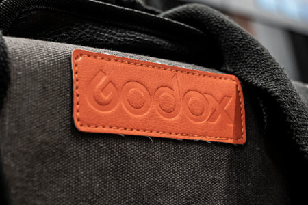 Krasnoyarsk, Russia, June 20, 2020: godox logo on a branded bag with a set of lighting equipment for photography, close-up.のeditorial素材