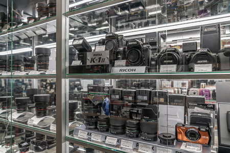 Krasnoyarsk, Russia, June 20, 2020: Pentax K1 ii cameras and photo lenses on the counter of a photo store.のeditorial素材