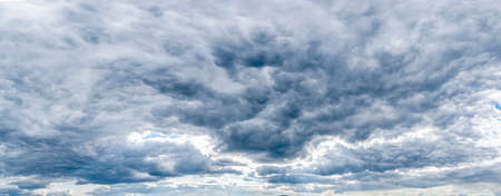 textural blue dark sky clouds, gloomy landscape.