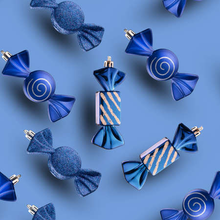 Seamless pattern set of Christmas toys, blue sweet candies on a light blue background.の写真素材