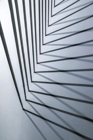 Abstract lines and shadows, pipe geometry on a white background. Interior of the room, contemporary art, installation fragmentの写真素材