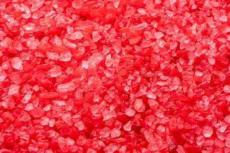 abstract background of red crystals. bath salt fragrant close-upの写真素材