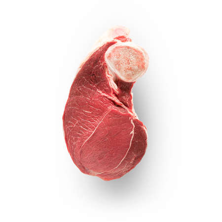 Raw steak on white background. beef is a source of animal proteins and carbohydrates, the basis of the human diet. but excessive consumption of meat, especially barb or grilling, can lead to negative results. For example, high cholesterolの写真素材