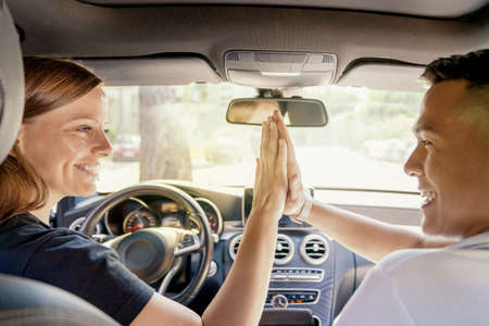 a woman buys a car or takes a car for rent. perhaps an Asian boyfriend gave a car, a handshake in...