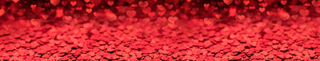 red background of small hearts, long panorama layout defocusedの写真素材