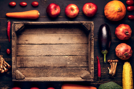copy space harvest wooden box autumn vegetables food delivery healthy foodの写真素材