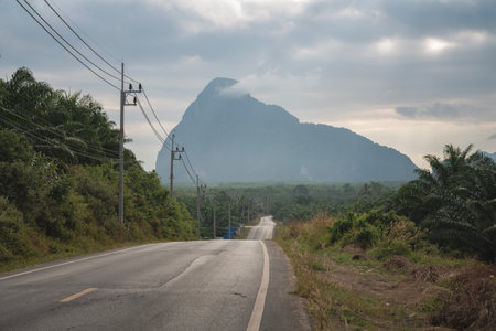 Beautiful road to the mountains at dawn. The route to the Samet Nangshe observation deck in Thailand. Travel and tourismの写真素材