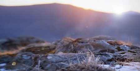 Empty mockup model in the mountains, blue cold natural background with a natural podium in the form of stones, mountain landscapeの写真素材