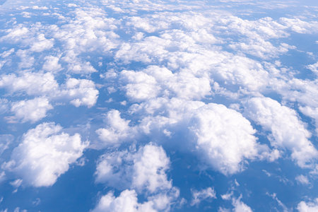 Vast Blue Sky with Soft White Clouds A Peaceful and Dreamy Natural Backdrop Perfect for Calm,...