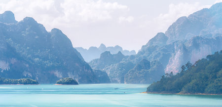 The serene landscape includes Misty Mountains and Calm waters that create a picturesque landscape....