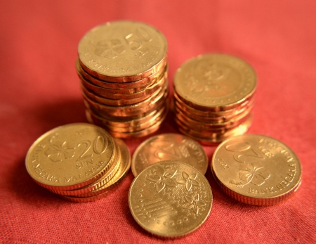 Coins over red background 