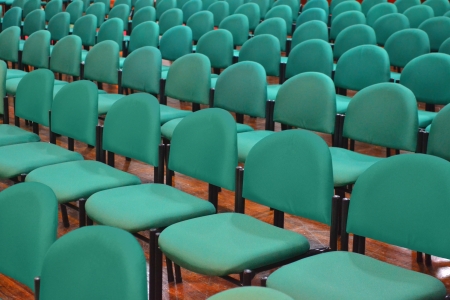 Rows of Green Chairs in a Seminar Hallの写真素材