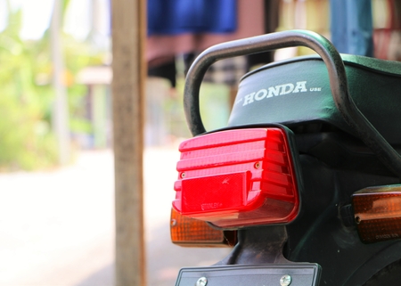 Kuala Lumpur, Malaysia  - August 29, 2015: Rear view of small capacity motorbike park outdoor is the most popular and cheapest transportation in Kuala Lumpur, Malaysiaのeditorial素材