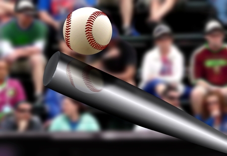 Baseball bat hitting ball with spectator backgroundの写真素材