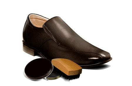 Men brown shoe with polisher and brushの写真素材