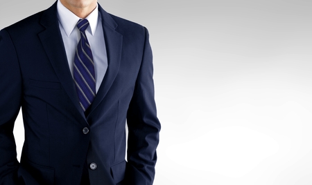 Man in business suit over whiteの写真素材
