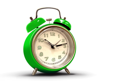 Retro alarm clock with green body and numbersの写真素材
