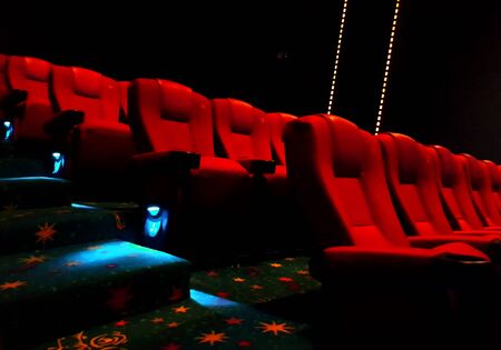 Empty red cinema or theater seatsの写真素材