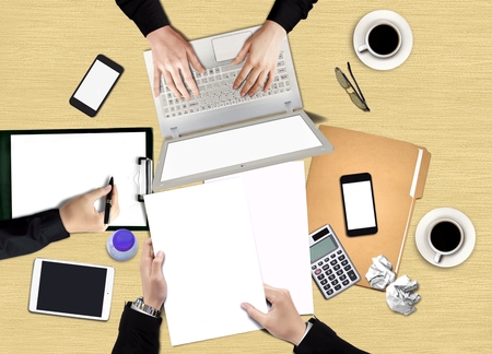Business discussion meeting from top viewの写真素材