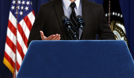Spokesperson giving a speech announcement during press conferenceの写真素材
