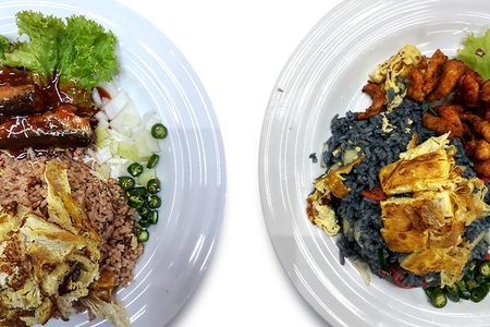 Malaysian food in plate over whiteの写真素材